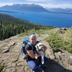 lisa walker with her dog on a hike